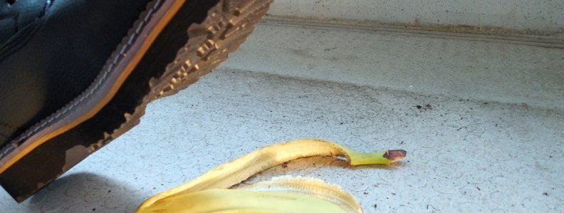 Close up of someone about to step on a banana peel