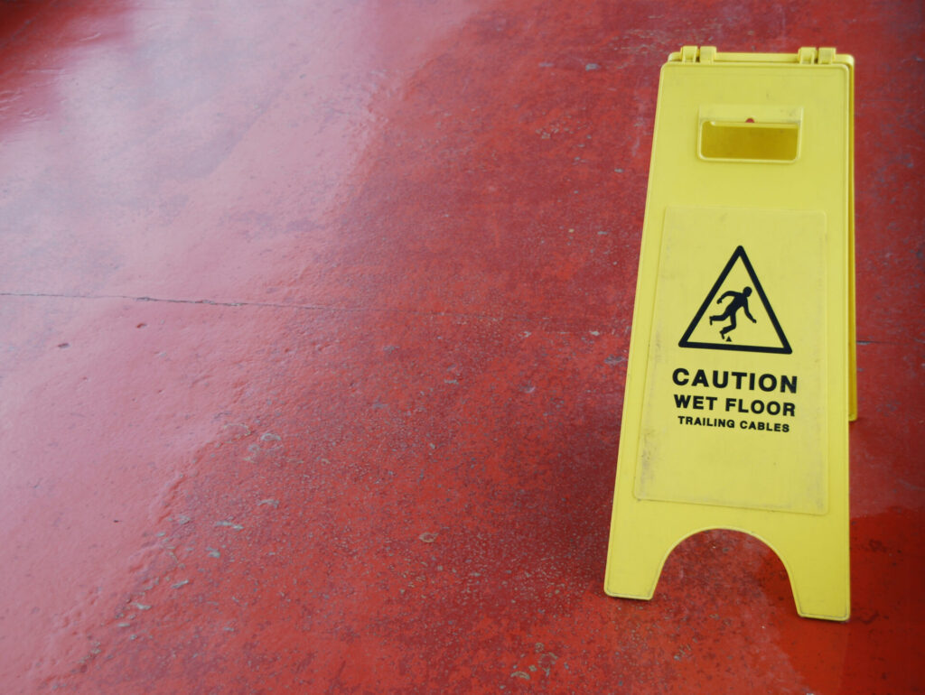 Includes keywords like "wet floor," "Florida," and "premises" for SEO while describing the image for accessibility.