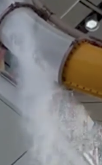 Water slide malfunction on Royal Caribbean's Icon of the Seas with acrylic panel break and spraying water, illustrating cruise ship injury risks.