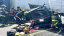 Firefighters from St. Lucie County Fire District rescue trapped victims from a crushed black SUV under a jackknifed semi-truck trailer on Florida Turnpike in Fort Pierce, with debris scattered on the road.
