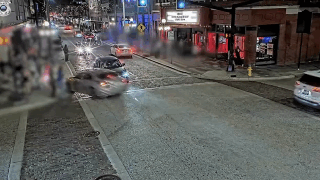 Surveillance footage of speeding car crashing into Bradley's on 7th bar patio in Ybor City, Tampa, moments before impact on November 8, 2025.