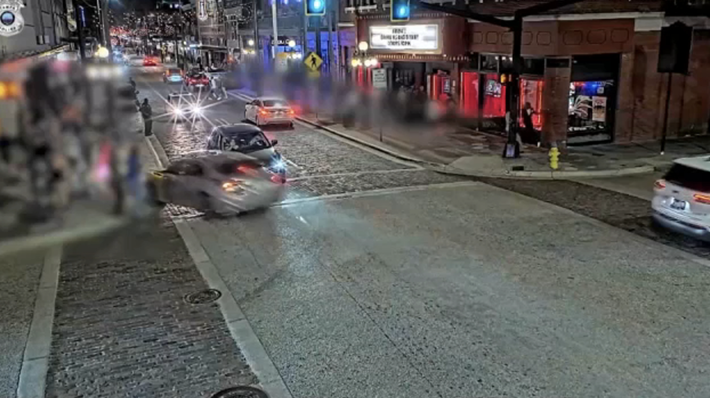 Surveillance footage of speeding car crashing into Bradley's on 7th bar patio in Ybor City, Tampa, moments before impact on November 8, 2025.