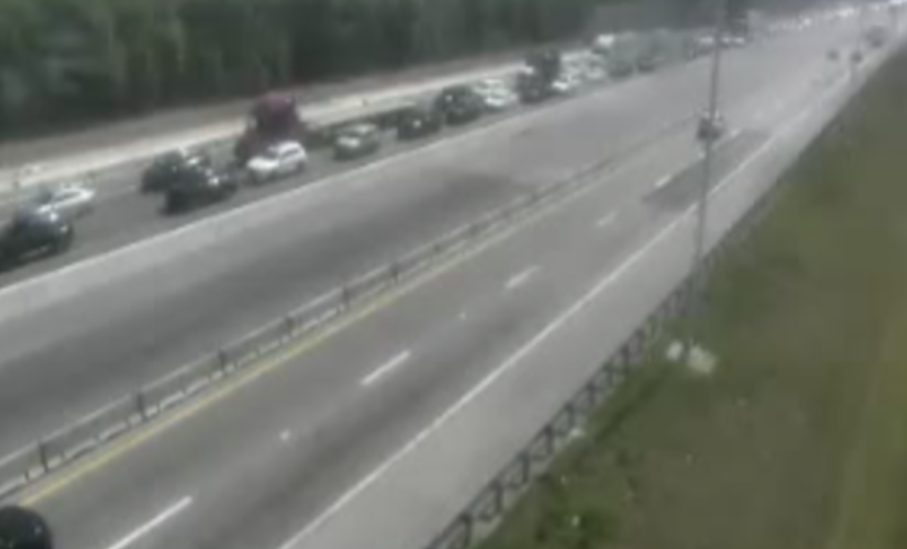 Traffic camera view of backed-up vehicles on Florida's Turnpike near Boynton Beach after fatal rollover crash at Mile Marker 90 on February 14, 2026