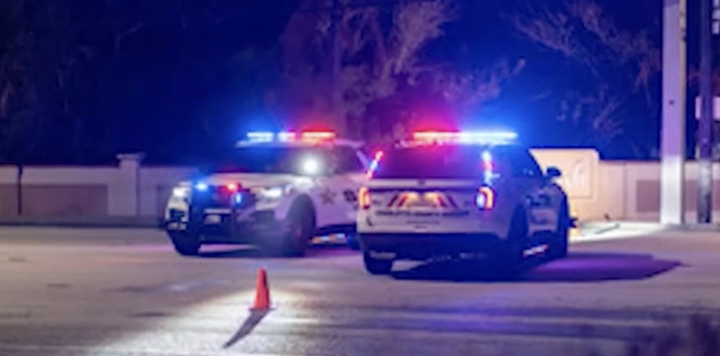 Charlotte County Sheriff's Office vehicles with emergency lights responding to fatal crash on Harborview Road in Port Charlotte, Florida