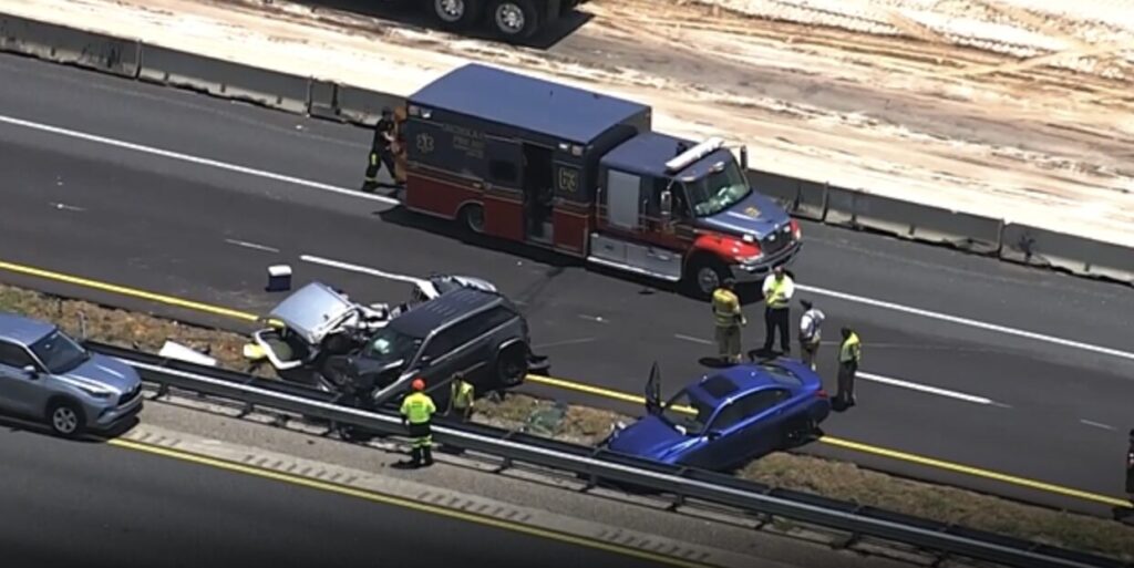 Osceola County Fire Rescue at the scene of a multi-vehicle dump truck crash on Florida's Turnpike near Osceola Parkway